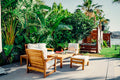 Teak outdoor dining table with chairs - placeholder photo